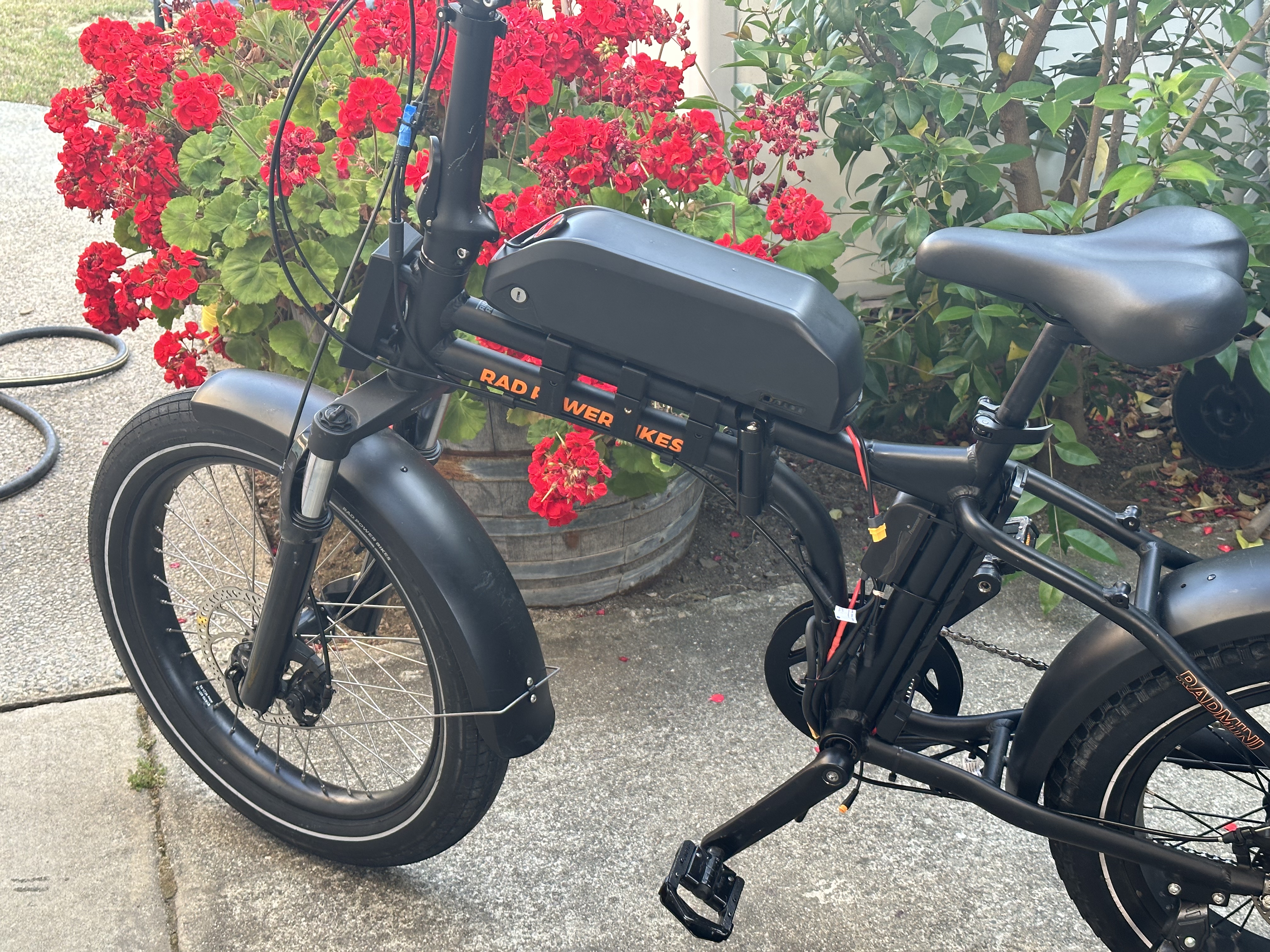 Printed parts attached to bike with battery installed