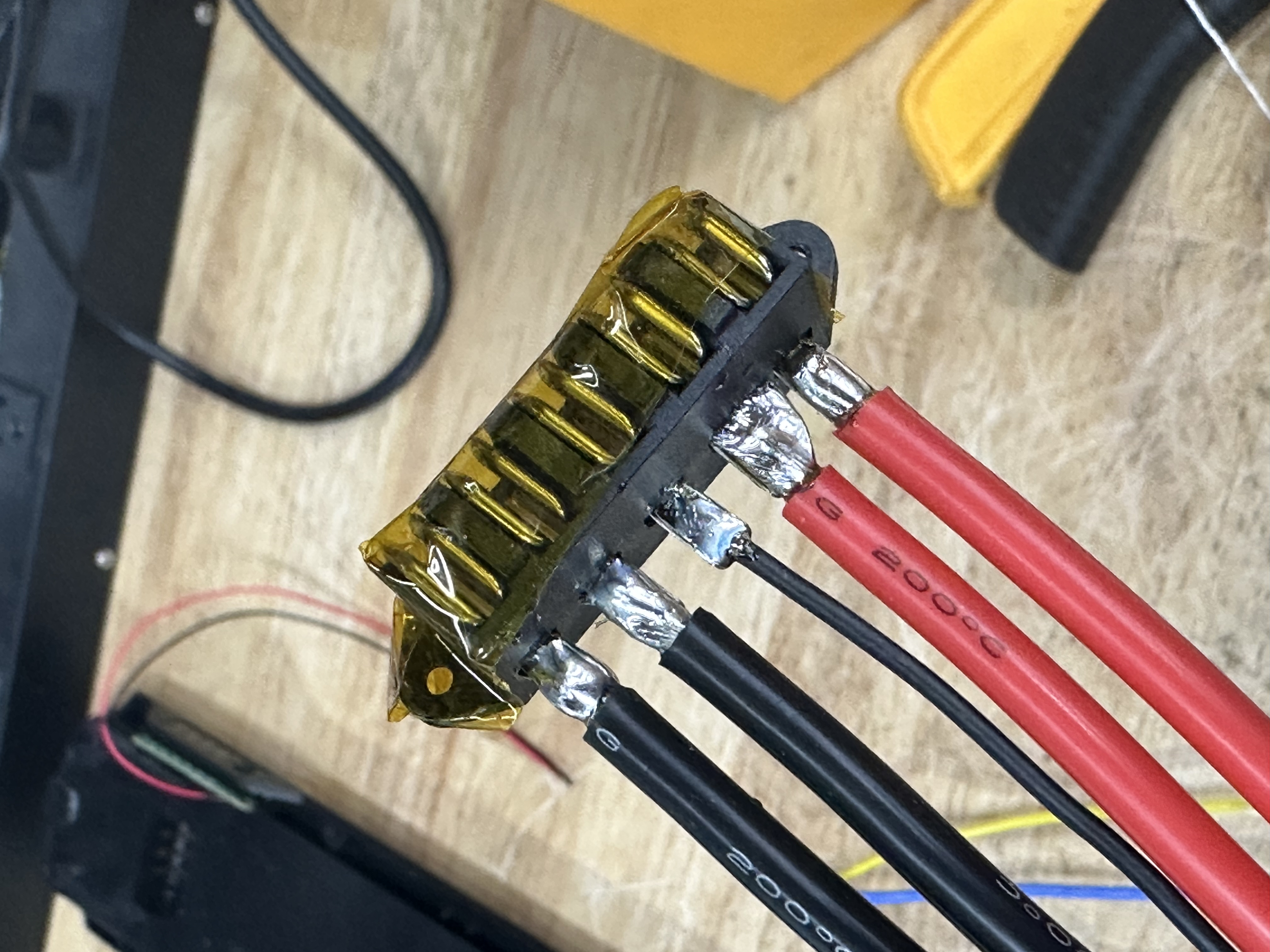 Five wires connected to battery terminals